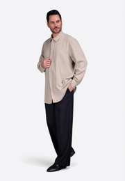 Model wearing classic black linen trousers by East Vibe